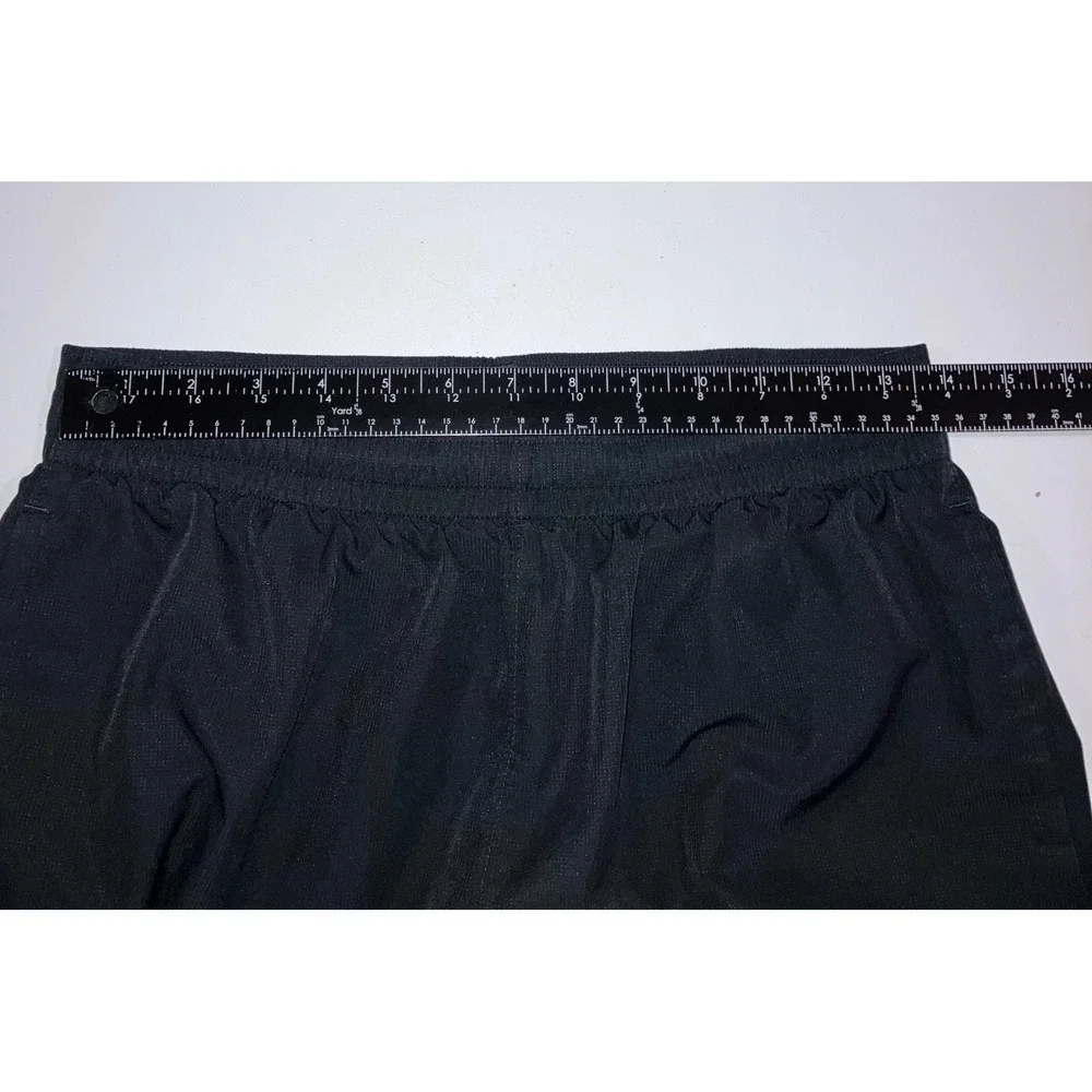 Under Armour Track Pants Men Medium 28x31 Loose Wide Leg Zip Ankle Spellout Logo